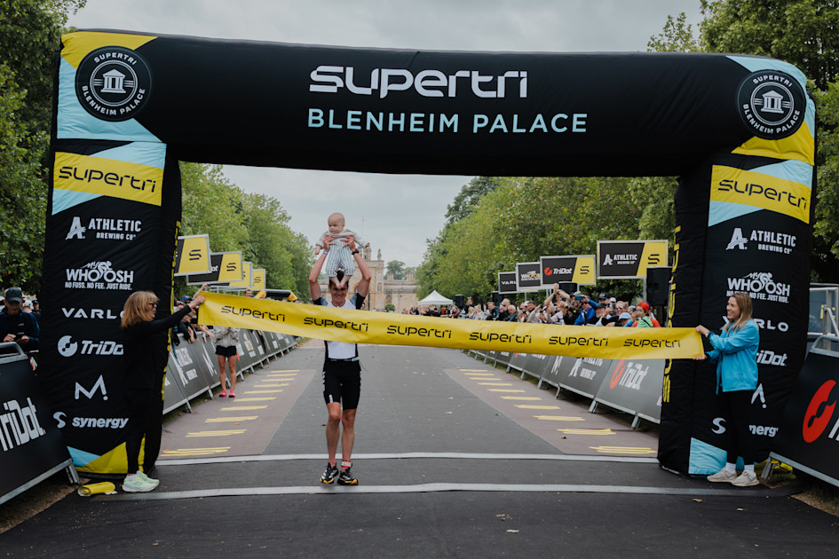 Jonny Brownlee crossed the finish line with his son Freddie as he made history at Supertri Blenheim Palace, becoming the first athlete ever to complete 10 sprint-distance triathlons across a single weekend in the event's Weekend Warrior challenge.