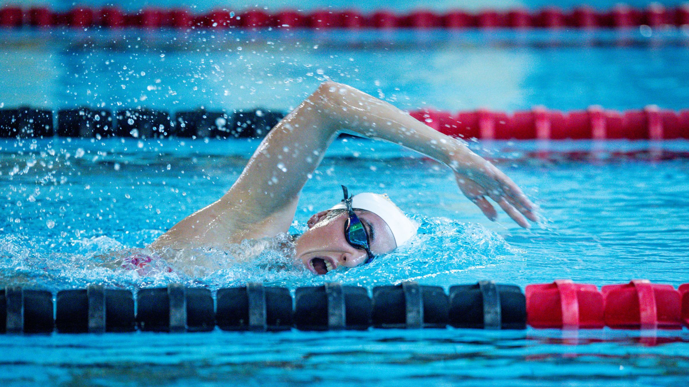 A Physical Therapist Guides Triathletes in Fixing Swim Breathing Problems